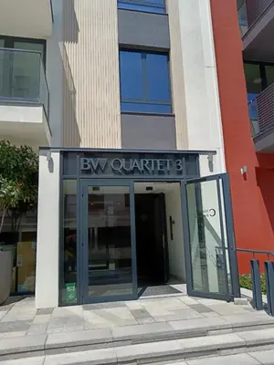an entrance to a building with a glass door at Belgrade Waterfront Shine Quartet 3 in Belgrade