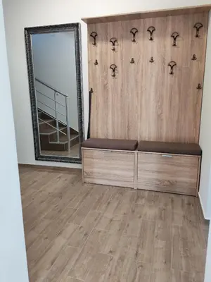a dressing room with a mirror and a bench at LipaHill Luxe in Ripanj