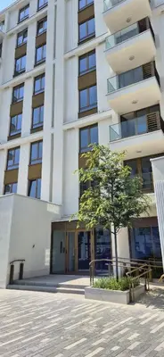 a building with a tree in front of it at Apartment Luxe Corner BW in Belgrade