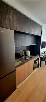 a kitchen with a sink and a counter top at BW Queen Apartman 412-whit free garage parking in Belgrade