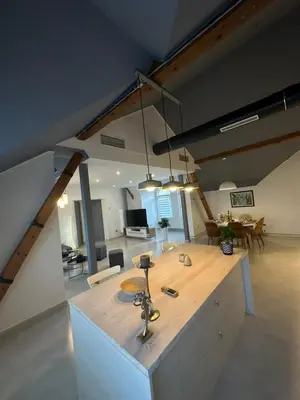 a kitchen with a large island in a room at Iva Lux2 in Belgrade