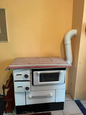a kitchen with an oven with a counter top at Vikendica Mali Pozarevac