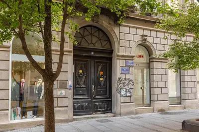 a store front with a black door on a building at MONE 2 bedroom apartment in Belgrade