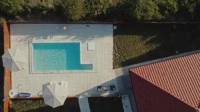 an overhead view of a swimming pool on a building at Avalska Bajka in Ripanj