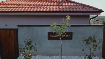 a sign on the side of a house at Avalska Bajka in Ripanj