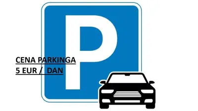 a sign with a car parked in front of a parking sign at DELTA CITY Apartment in Novi Beograd