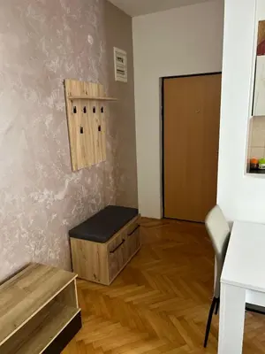 a room with a desk and a chair and a door at Centar stan na dan Ub in Ub