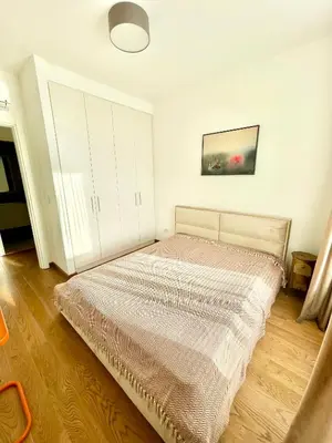 a bedroom with a large bed in a room at Melania in Belgrade