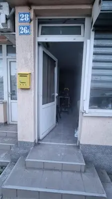 an entrance to a building with a white door at Stan na dan Beoshoping in Belgrade
