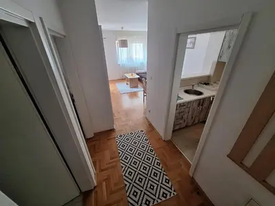 a view of a bathroom with a sink and a mirror at Amar6 in Novi Beograd