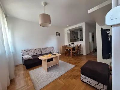 a living room with a couch and a table at Amar6 in Novi Beograd