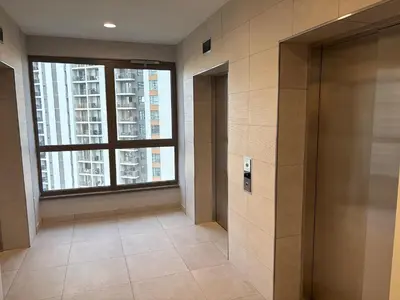 a hallway with a large window in a building at BW AQUA Joi Lux 2 Apartment in Belgrade