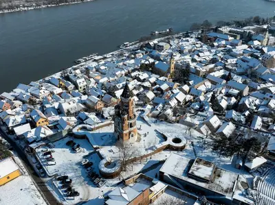 an aerial view of a city with blue roofs at Oasis Moonze in Zemun