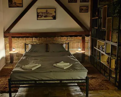 a bedroom with a bed with two towels on it at Airport Apartment AIR 2 in Surčin