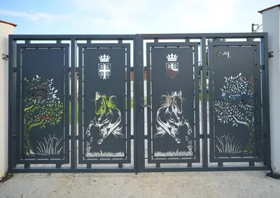 a gate with a mural of a horse on it at Forest House in Beljina