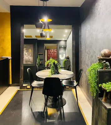a dining room with a table and chairs at Knez in Belgrade