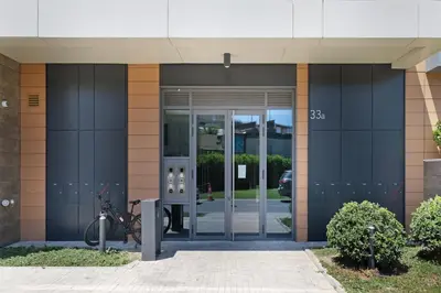 an entrance to a building with a bike parked outside at New Luxury Dorcol Downtown Apartment in Belgrade