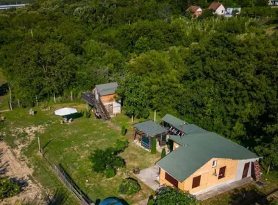 an aerial view of a house with a green roof at Eko dan in Železnička Stanica Karlovački Vinogradi