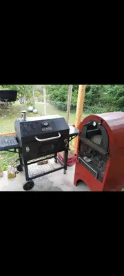 a bbq and a grill on a trailer at Eko dan in Železnička Stanica Karlovački Vinogradi