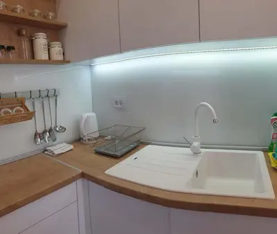 a kitchen with a sink and a counter top at A Blok Exclusive Suite with garage in Belgrade