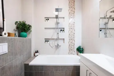 a white bathroom with a tub and a sink at Heart Strings with Terrace 290 Mbps Old Town in Belgrade