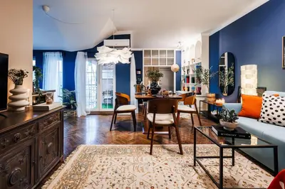 a living room with a couch and a table at Heart Strings with Terrace 290 Mbps Old Town in Belgrade