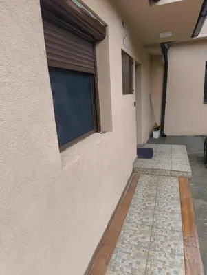 a building with a window on the side of it at IN Zemun Gardos Apartment in Belgrade
