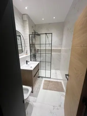 a bathroom with a sink and a toilet at MiVa Apartment in Belgrade