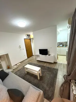a living room with a couch and a table at A&D apartment in Belgrade
