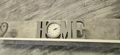a sign with a clock on top of it at Lux Apartman Stojanović in Belgrade