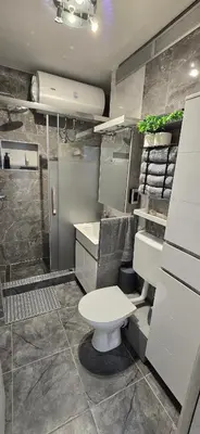 a bathroom with a toilet and a sink at Lux Apartman Stojanović in Belgrade