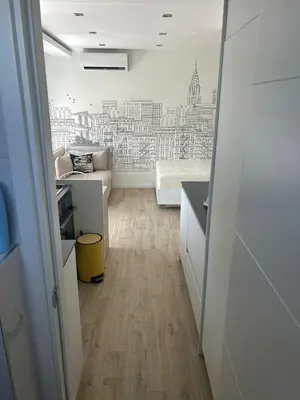 a small room with a view of a city at Chic City Studio in Belgrade