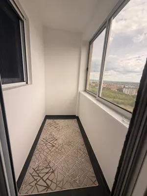 a room with a window and a floor with a view at Port 5 in Kalugjerica