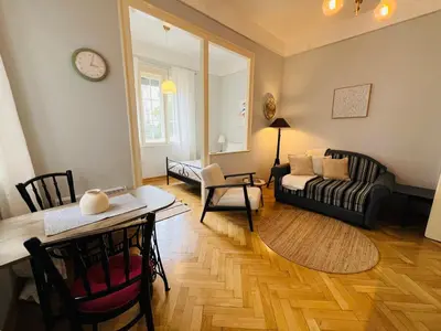 a living room with a couch and a table at Belgrade ST6 in Belgrade