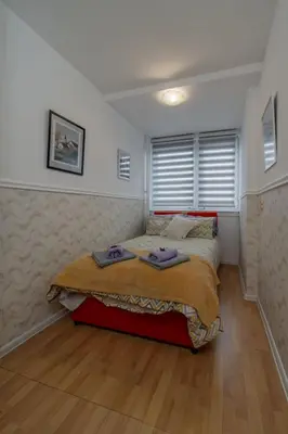 a bedroom with a large bed in a room at Panorama Novi Beograd in Belgrade