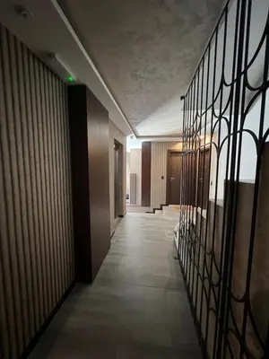 a hallway of a building with a fence at Belgrade Lounge in Belgrade