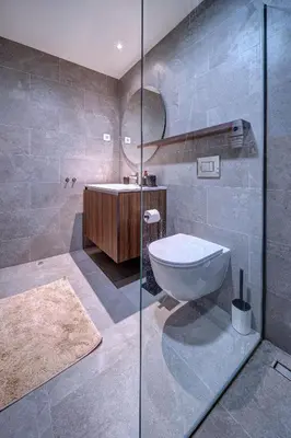 a bathroom with a sink and a toilet and a shower at Belgrade Waterfront Ana Premium Living in Belgrade