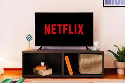 a tv sitting on top of a tv stand at Sunwave with Terrace 280 Mbps Old Town Renovated in Belgrade