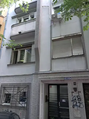 a building with graffiti on the side of it at Belgrade Apartment Dorcol in Belgrade
