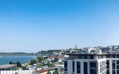 a view of the water from a building at Belgrade Waterfront Kalemegdan and River View with Garage in Belgrade