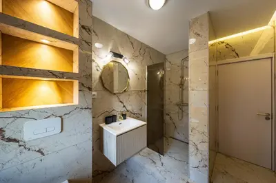 a bathroom with a sink and a shower at Anja D Apartments in Belgrade