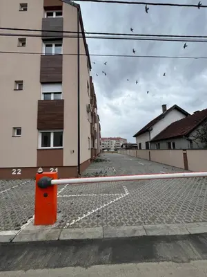 an empty street in front of a building at Mikos apartmani in Belgrade