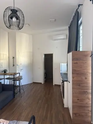 a living room with a couch and a table at Amar1 in Belgrade