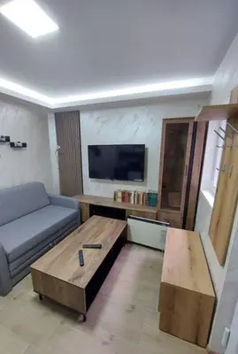 a living room with a couch and a coffee table at Radojkovic Apartman in Belgrade