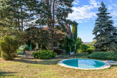 a house with a swimming pool in the yard at Kings Hill - Family Retreat in Sremski Karlovci