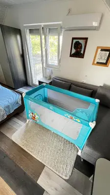 a large blue aquarium in a living room at Pokito House on the Hill in Sremski Karlovci