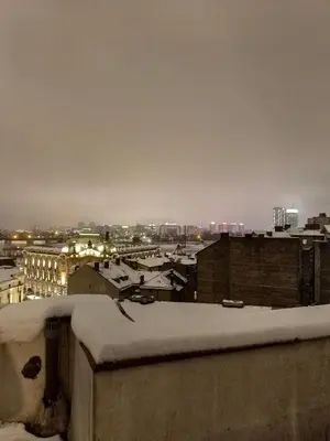 a view of a city with snow covered roofs at Belgrade on water view apartment - City center in Belgrade