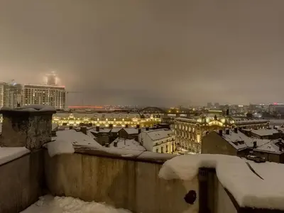 a view of a city with snow covered roofs at Belgrade on water view apartment - City center in Belgrade