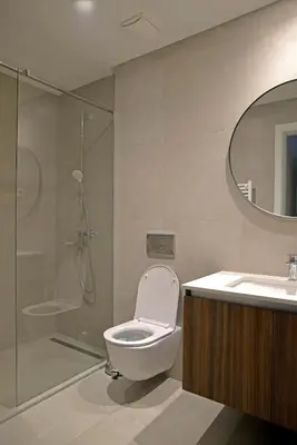 a bathroom with a shower and a toilet and a sink at Belgrade Waterfront Heaven! in Belgrade