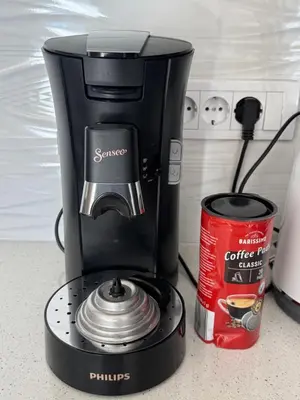 a coffee maker sitting on a counter next to a can at Petra in Stara Pazova